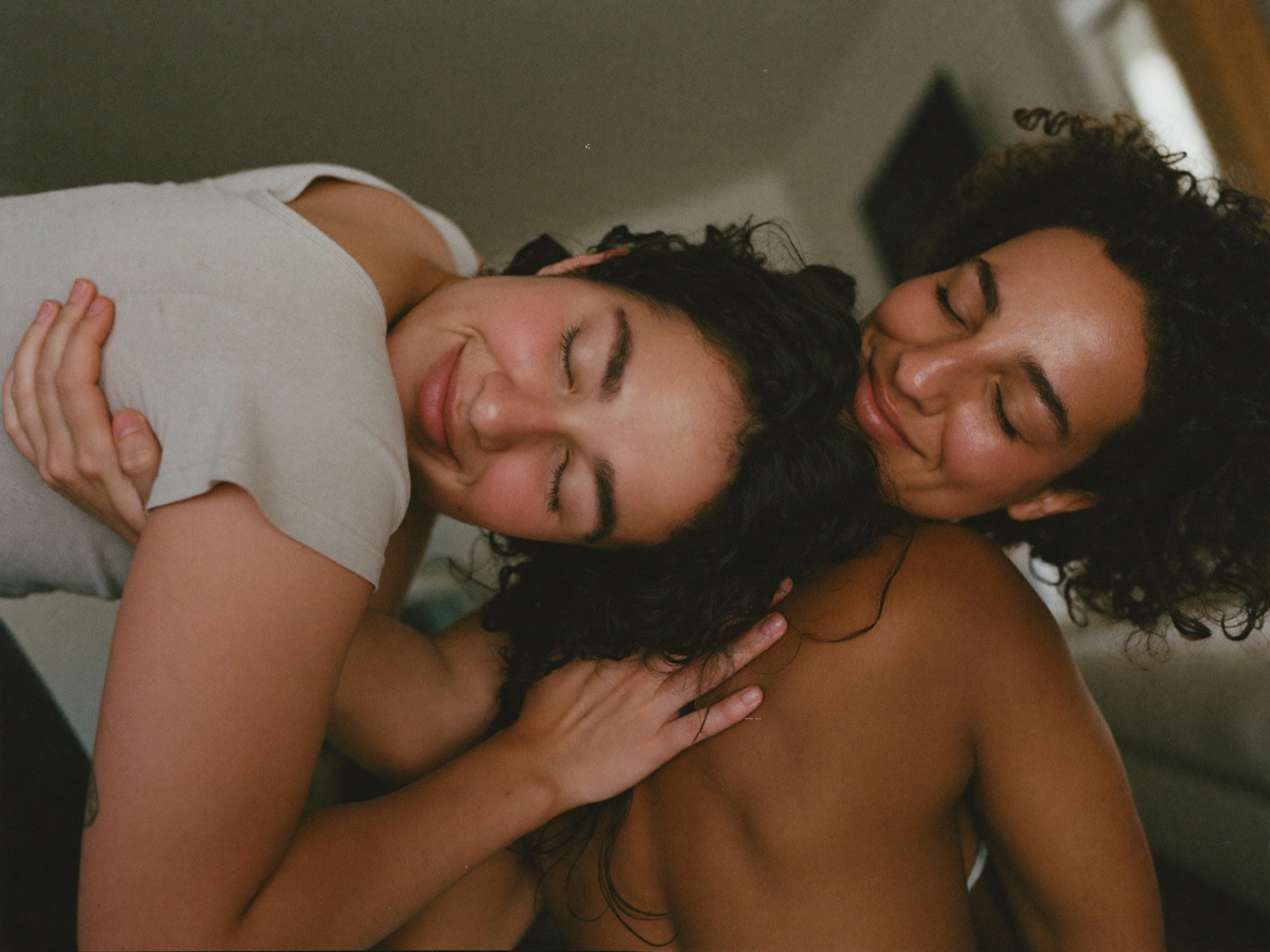 Two people hugging with visible relief